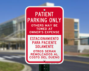 Bilingual reserved parking signs
