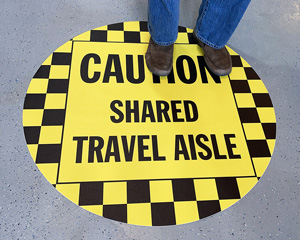 Shared aisle floor sign