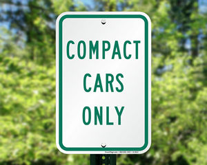 Compact cars only parking sign
