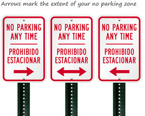 No parking any time sign in english and spanish