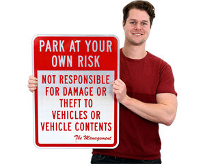 Park At Your Own Risk Signs