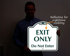 Reflective exit only sign