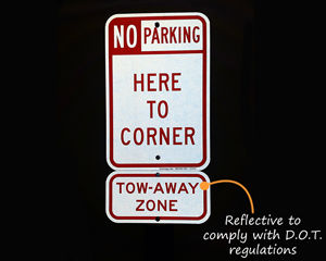 Reflective tow away sign
