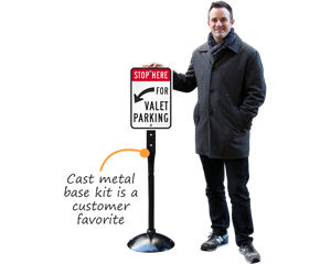 Valet parking sign on a cast iron sign base
