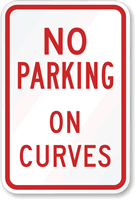 NO PARKING ON CURVES Sign
