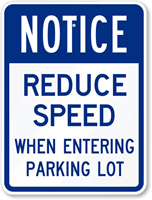 Notice Reduce Speed Sign
