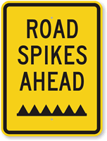 Road Spikes Ahead Sign