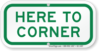 Here To Corner Supplemental Parking Sign