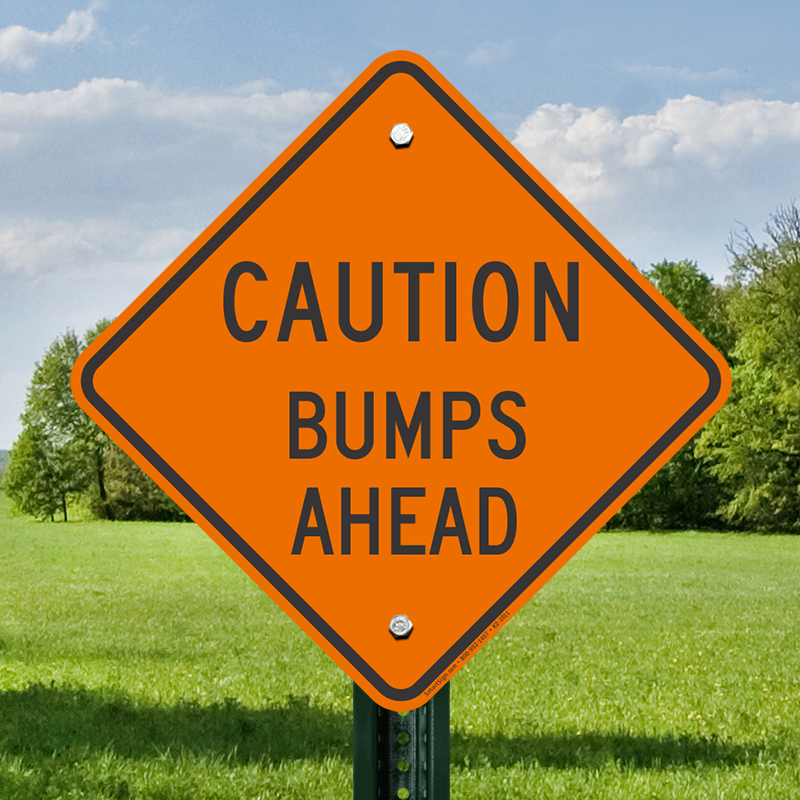 bumpy road sign