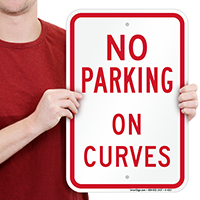 NO PARKING ON CURVES Signs