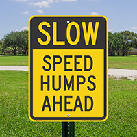 Speed Humps Ahead Slow Sign