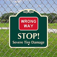 Wrong Way Severe Tire Damage Signature Sign