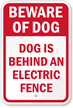 Beware Dog Is Behind An Electric Fence Sign