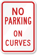NO PARKING ON CURVES Sign