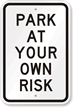 PARK AT YOUR OWN RISK Sign
