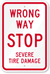 Wrong Way - Stop Severe Tire Damage Sign