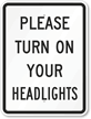 Please Turn On Your Headlights Sign