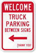 Truck Parking Between with Left Arrow Sign