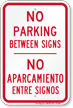 Bilingual No Parking Between Signs