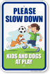 Please Slow Down Kids and Dogs at Play Sign