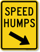 Speed Humps Sign with Down Arrow Pointing Right