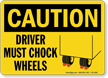 Driver Must Chock Wheels Caution Sign