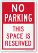 This Space Is Reserved No Parking Sign