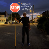 Reflective stop paddle with a post