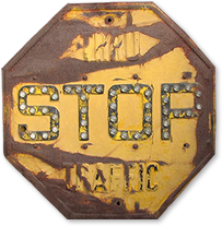 Yellow old-style stop sign from 1940s