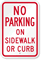 No Parking On Sidewalk Or Curb Sign